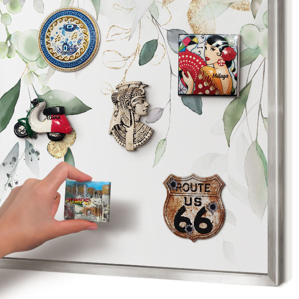 Souvenir magnet display board with a silver frame Green leaves