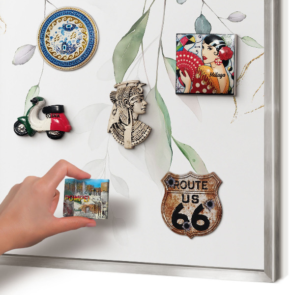 Souvenir magnet display board with a silver frame Green leaves