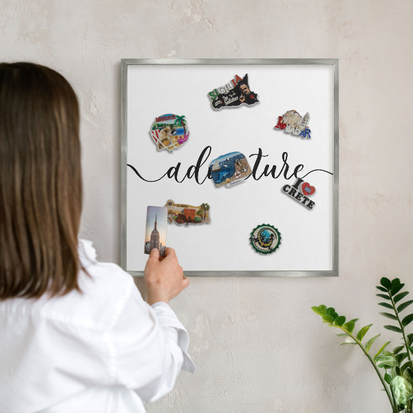 Printed magnet board in a silver frame Adventure written