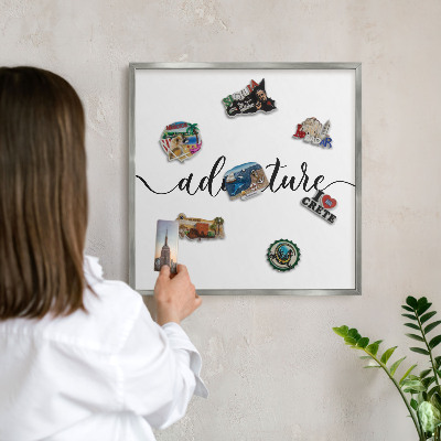 Printed magnet board in a silver frame Adventure written