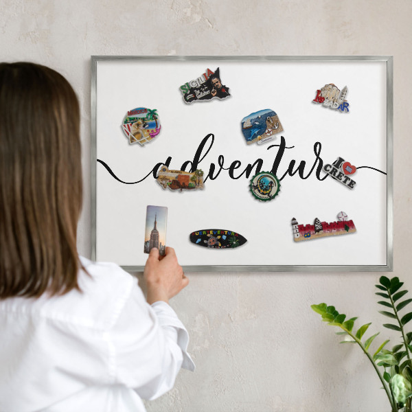Printed magnet board in a silver frame Adventure written