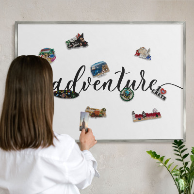 Printed magnet board in a silver frame Adventure written