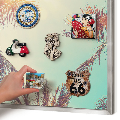 Souvenir magnet display board with a silver frame Tropical paradise