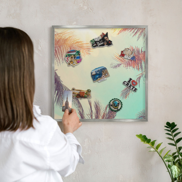 Souvenir magnet display board with a silver frame Tropical paradise