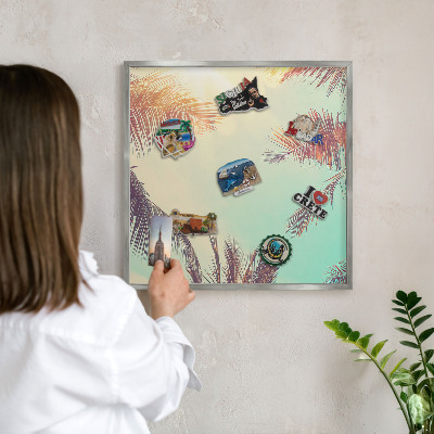 Souvenir magnet display board with a silver frame Tropical paradise