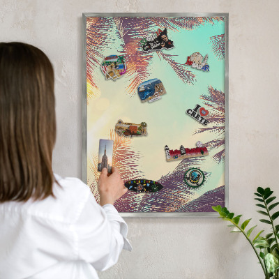 Souvenir magnet display board with a silver frame Tropical paradise