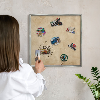 Souvenir magnet display board with a silver frame Wind rose