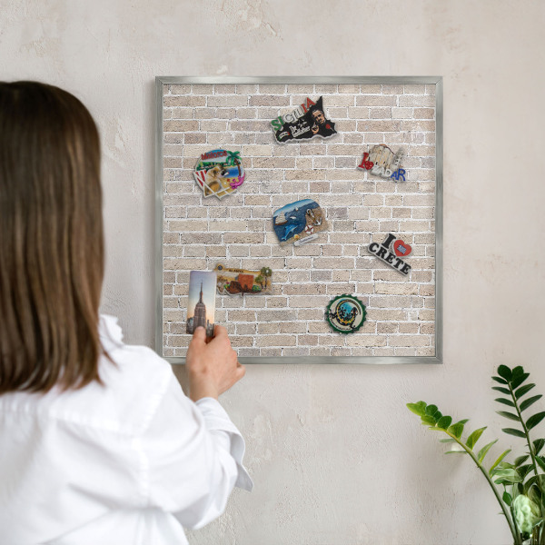 Souvenir magnet display board with a silver frame Brick pattern