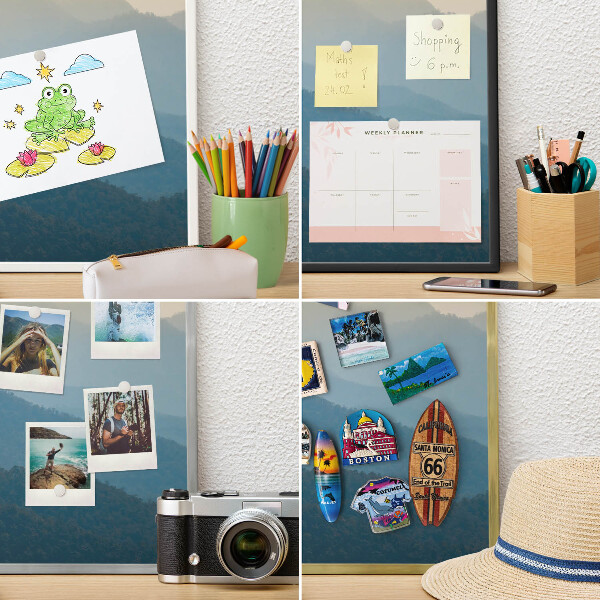 Souvenir magnet display board with a silver frame Mountain views