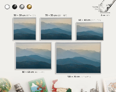 Souvenir magnet display board with a silver frame Mountain views