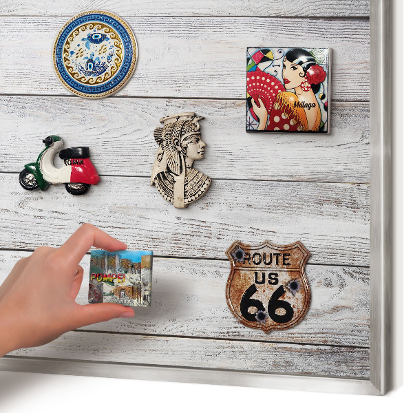 Souvenir magnet display board with a silver frame Rustic wood
