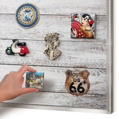Souvenir magnet display board with a silver frame Rustic wood