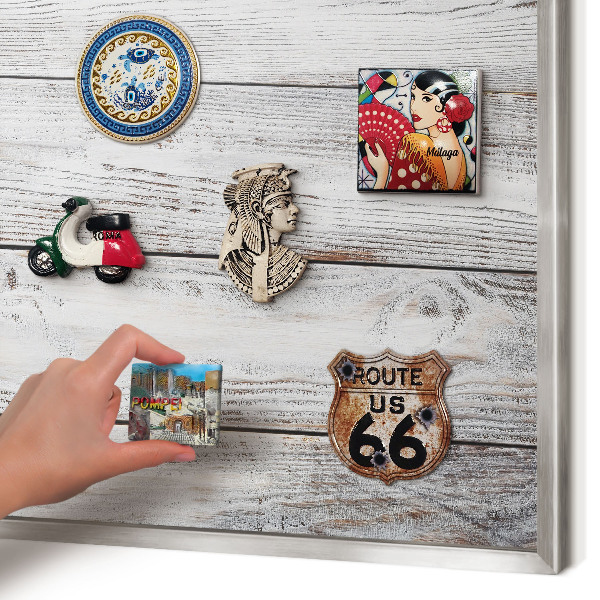 Souvenir magnet display board with a silver frame Rustic wood