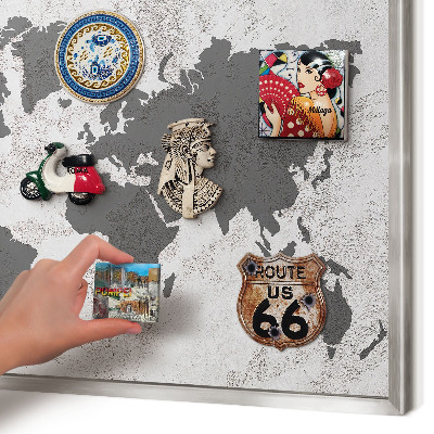 Souvenir magnet display board with a silver frame World map