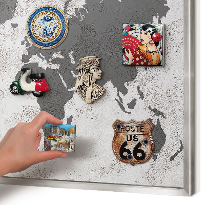 Souvenir magnet display board with a silver frame World map
