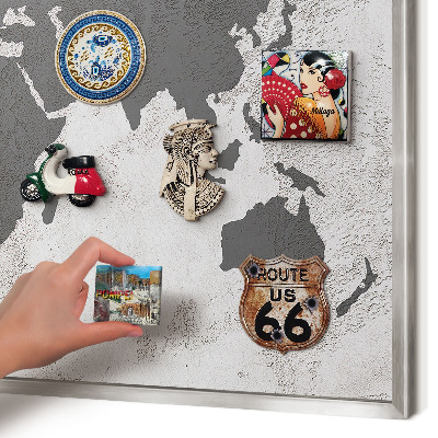 Souvenir magnet display board with a silver frame World map