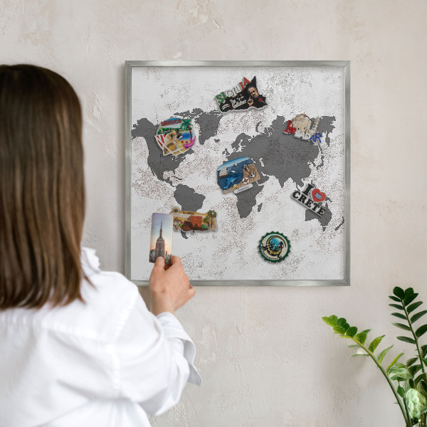 Souvenir magnet display board with a silver frame World map