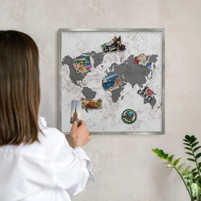 Souvenir magnet display board with a silver frame World map