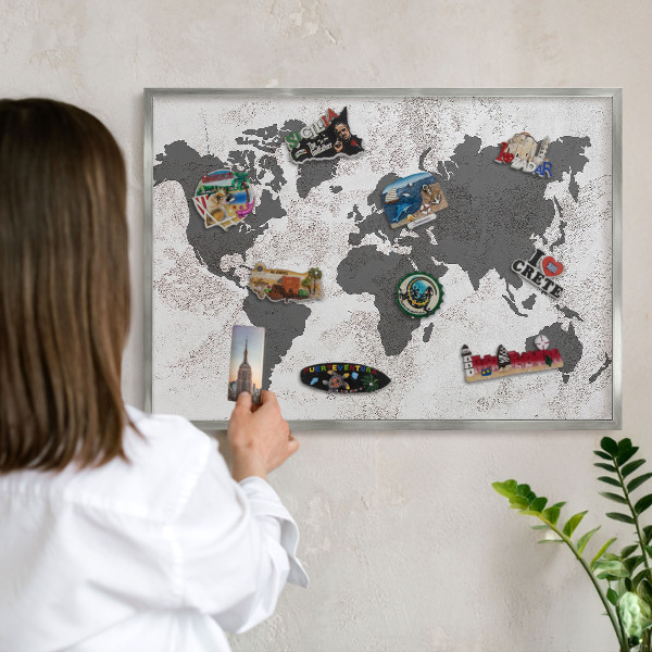 Souvenir magnet display board with a silver frame World map