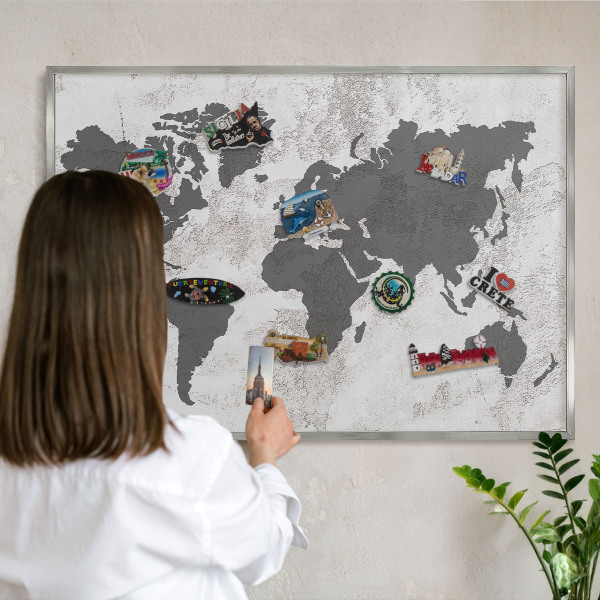 Souvenir magnet display board with a silver frame World map