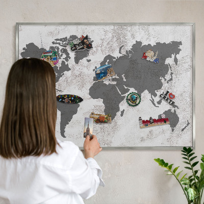 Souvenir magnet display board with a silver frame World map
