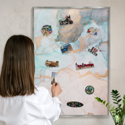 Souvenir magnet display board with a silver frame Pastel forms