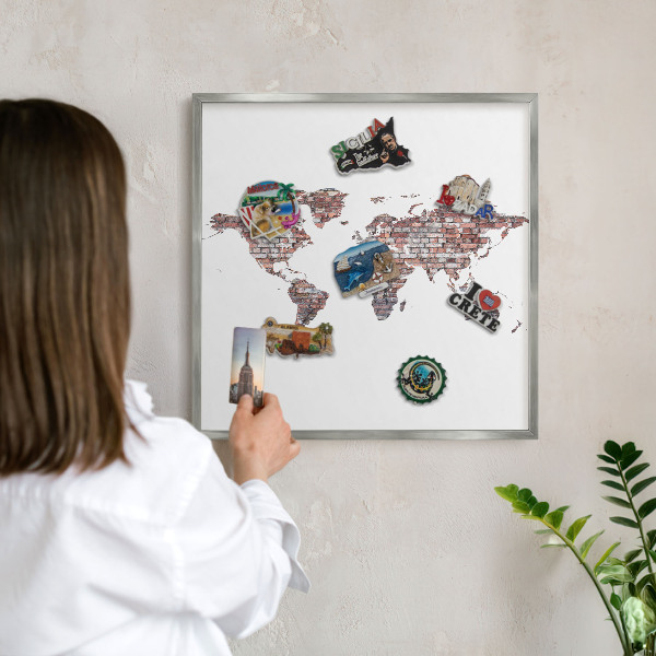 Souvenir magnet display board with a silver frame Brick world