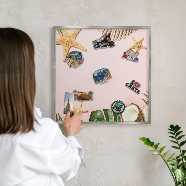 Souvenir magnet display board with a silver frame Tropical vacation
