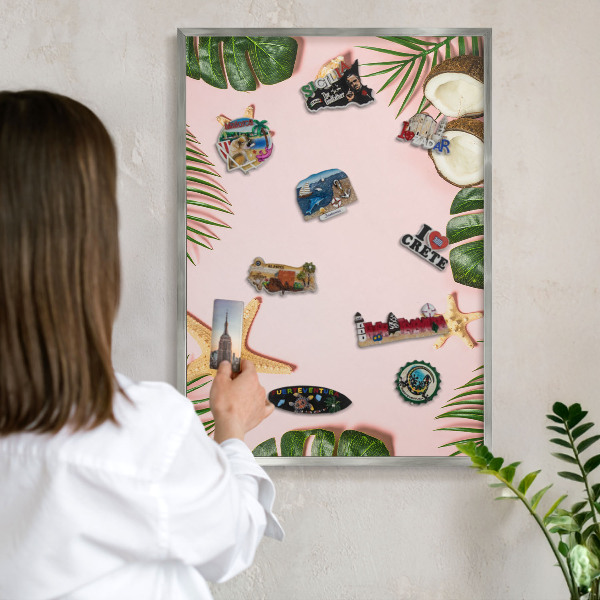 Souvenir magnet display board with a silver frame Tropical vacation