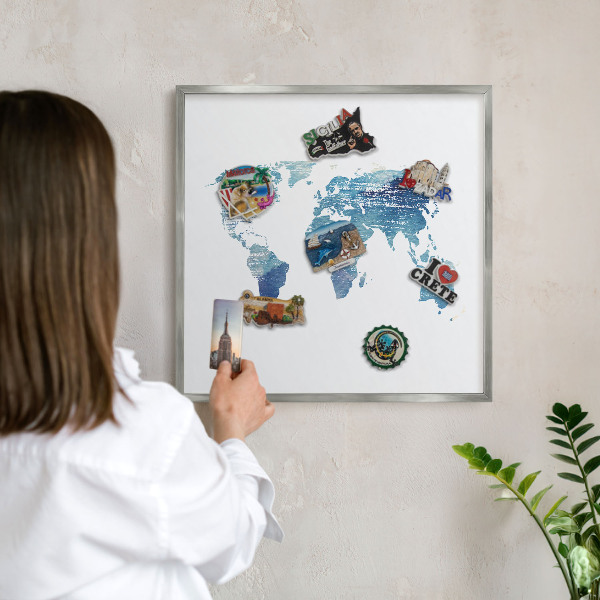 Souvenir magnet display board with a silver frame Watercolor map