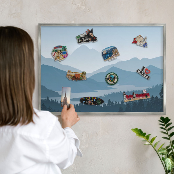 Souvenir magnet display board with a silver frame Mountain harmony