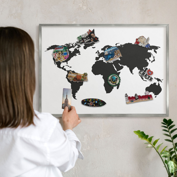 Souvenir magnet display board with a silver frame World map