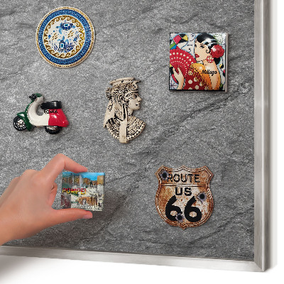 Souvenir magnet display board with a silver frame Gray stone