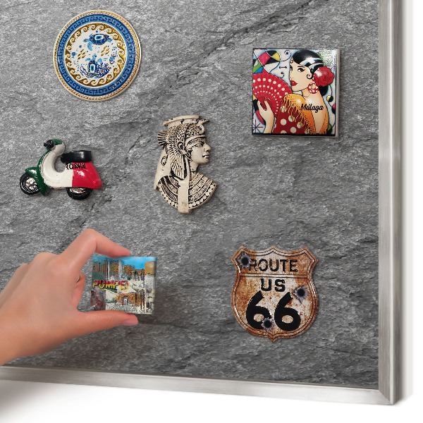 Souvenir magnet display board with a silver frame Gray stone