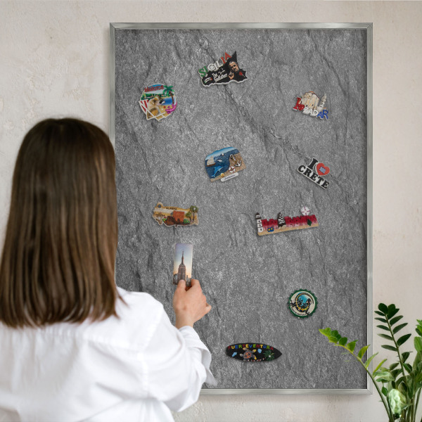 Souvenir magnet display board with a silver frame Gray stone
