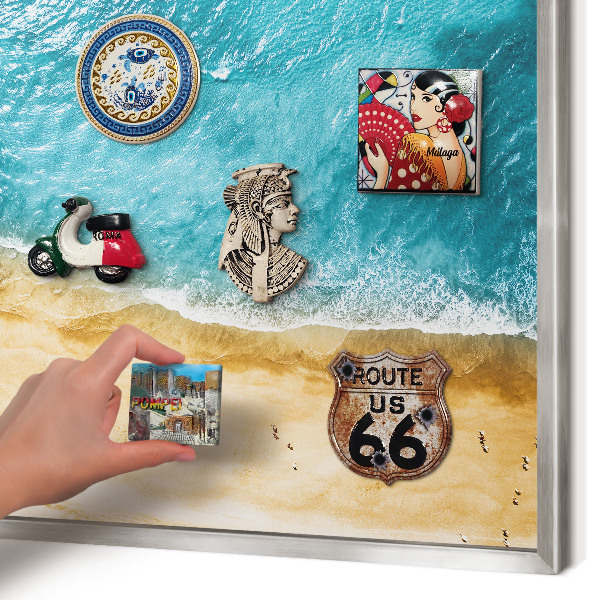 Souvenir magnet display board with a silver frame Sea and beach