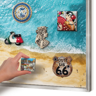Souvenir magnet display board with a silver frame Sea and beach