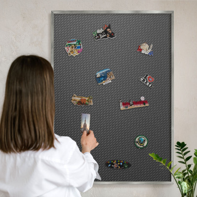 Souvenir magnet display board with a silver frame Geometric texture