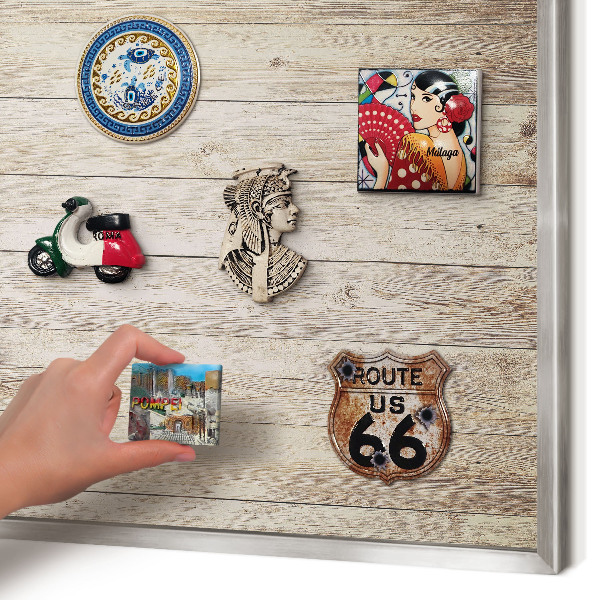 Souvenir magnet display board with a silver frame Wooden texture