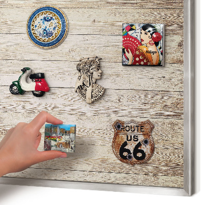 Souvenir magnet display board with a silver frame Wooden texture
