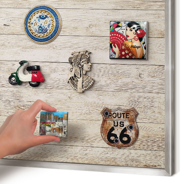 Souvenir magnet display board with a silver frame Wooden texture