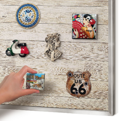 Souvenir magnet display board with a silver frame Wooden texture