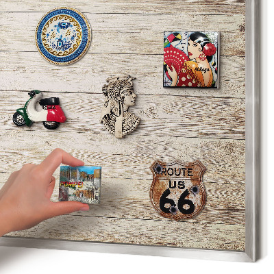 Souvenir magnet display board with a silver frame Wooden texture