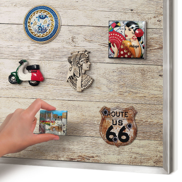 Souvenir magnet display board with a silver frame Wooden texture