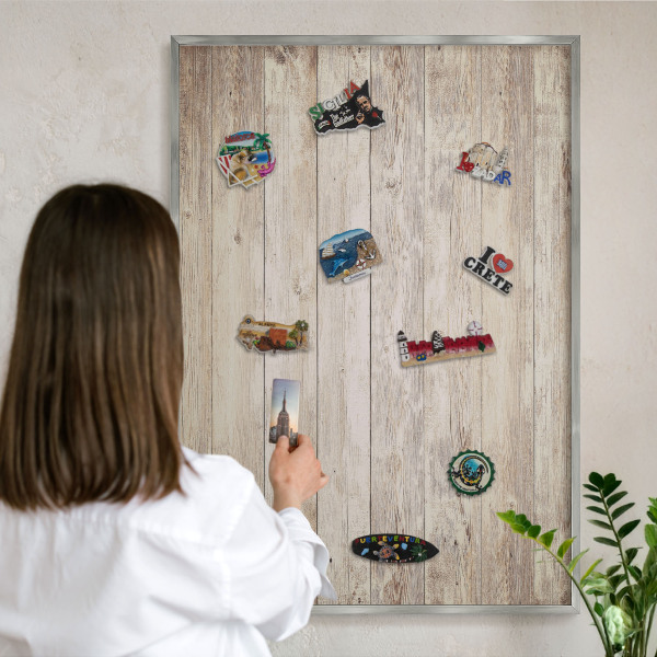Souvenir magnet display board with a silver frame Wooden texture