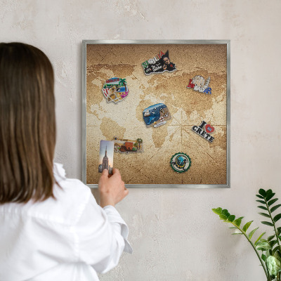 Souvenir magnet display board with a silver frame Old map