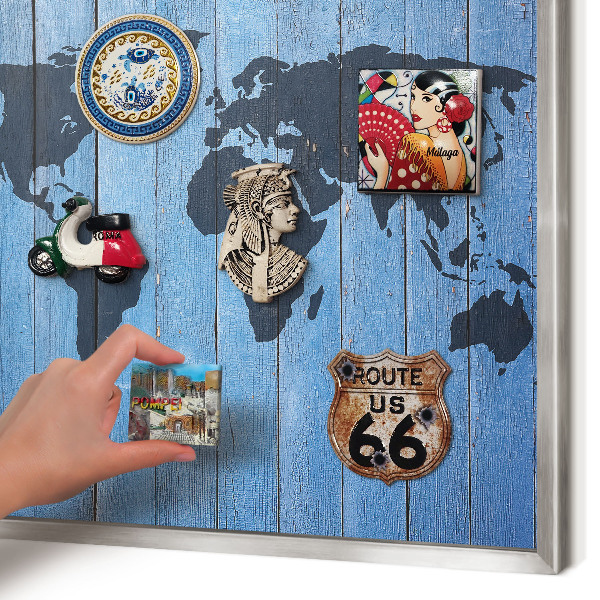 Souvenir magnet display board with a silver frame World map