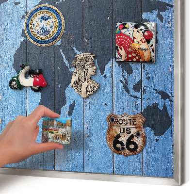 Souvenir magnet display board with a silver frame World map