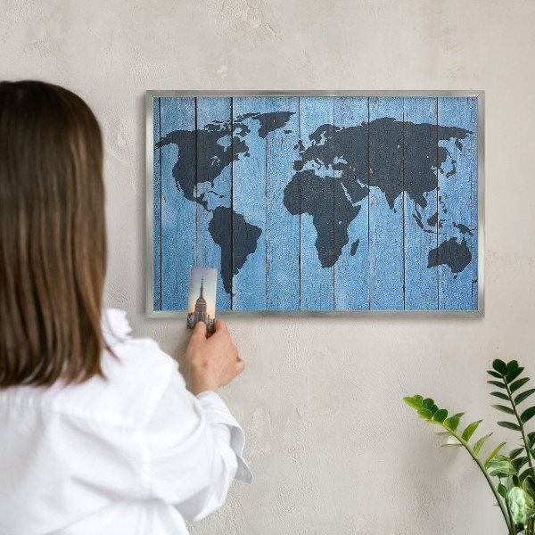 Souvenir magnet display board with a silver frame World map