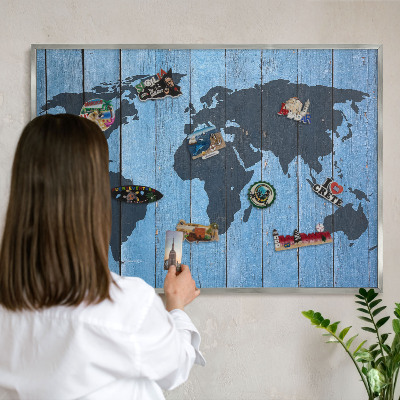 Souvenir magnet display board with a silver frame World map